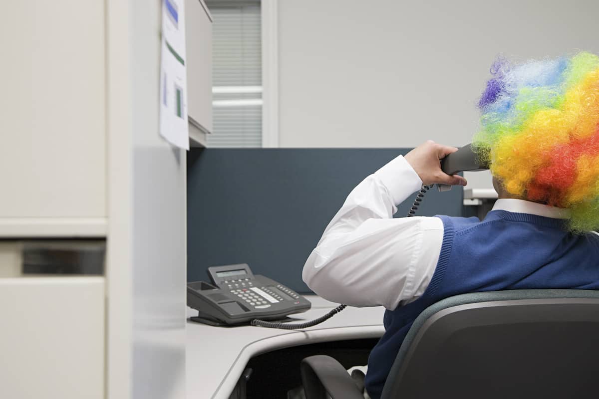 guy dressed as clown at work