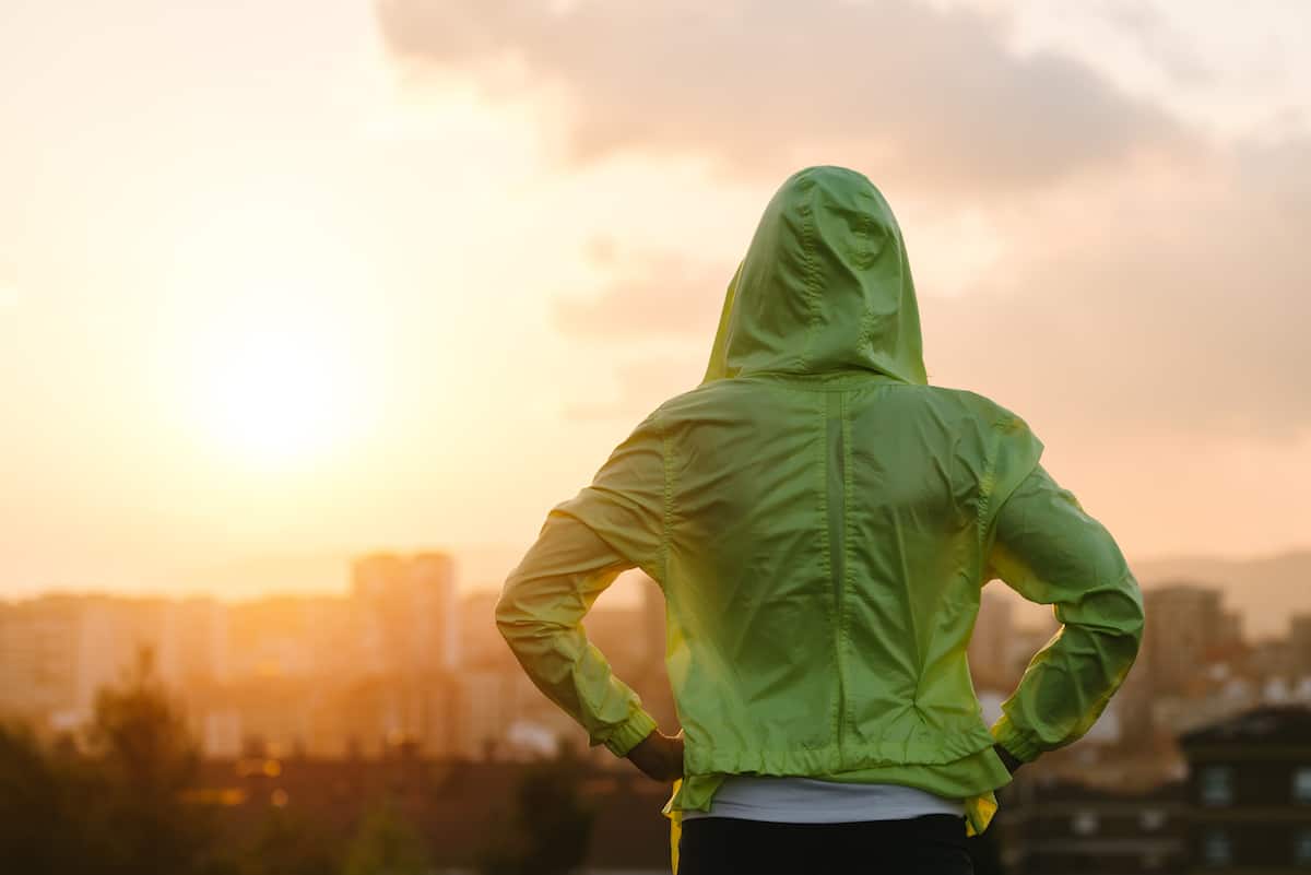 woman looking at sunset