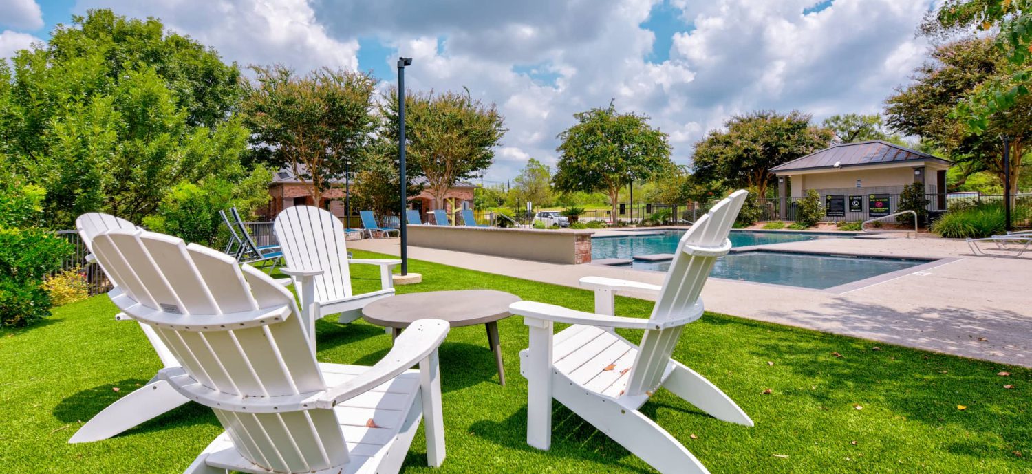 poolside chairs at a San Antonio apartment complex