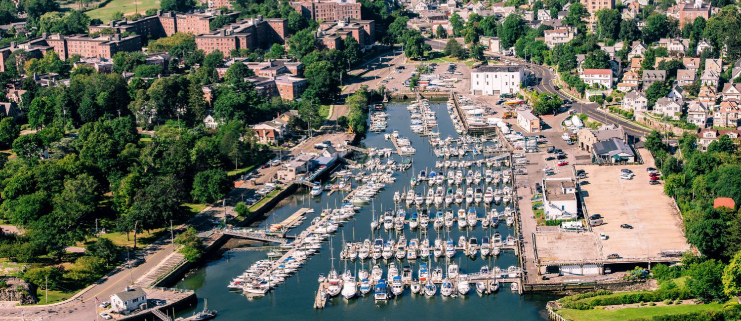 Drone view of the harbor in New Rochelle, a city in New York that is full of pros and cons
